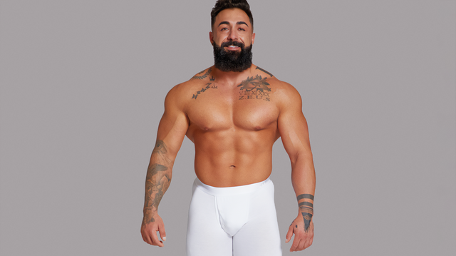 Man wearing Alphx union pant in frost white large athletic fit